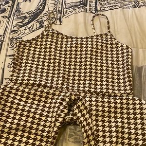Brown spaghetti strap houndstooth jumpsuit. Never been worn. No tags